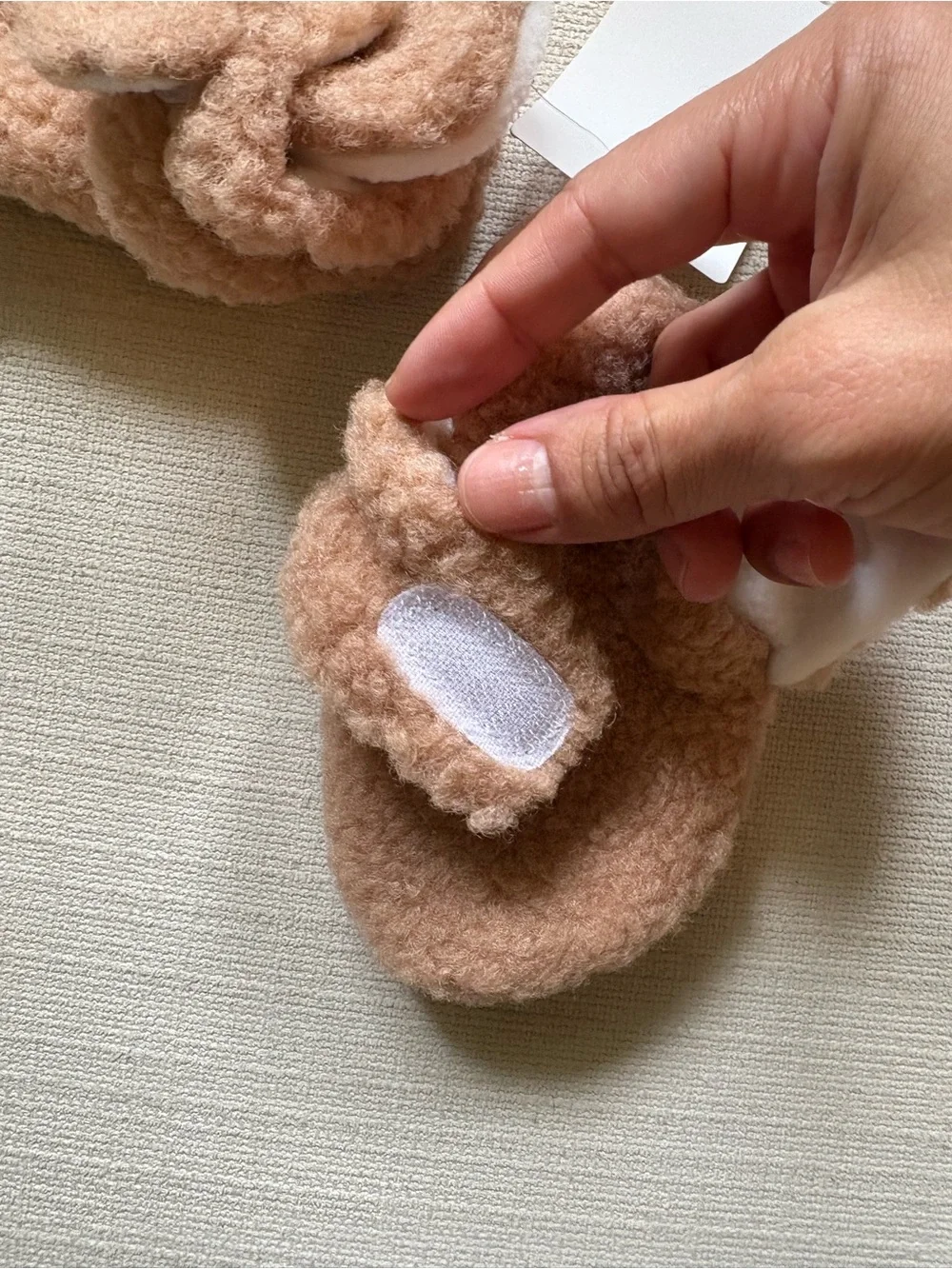 Cozy Plush Baby Booties in soft blush pink taupe